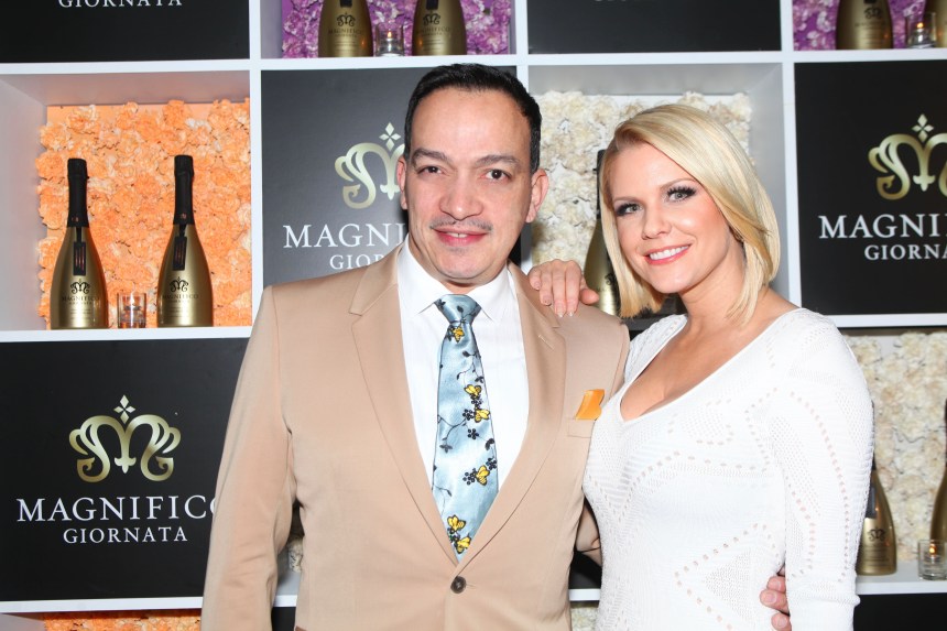 Anthony Rubio with host Carrie Keagan at Magnifico Giornata's Infused Essence Launch Party