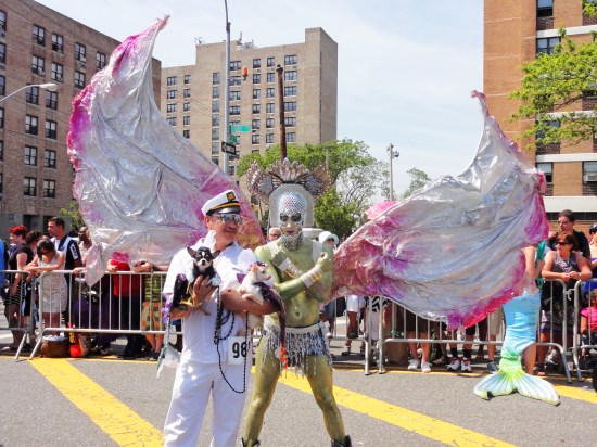 Anthony Rubio with Bogie & Kimba attend 2013 Coney Island Mermaid Parade