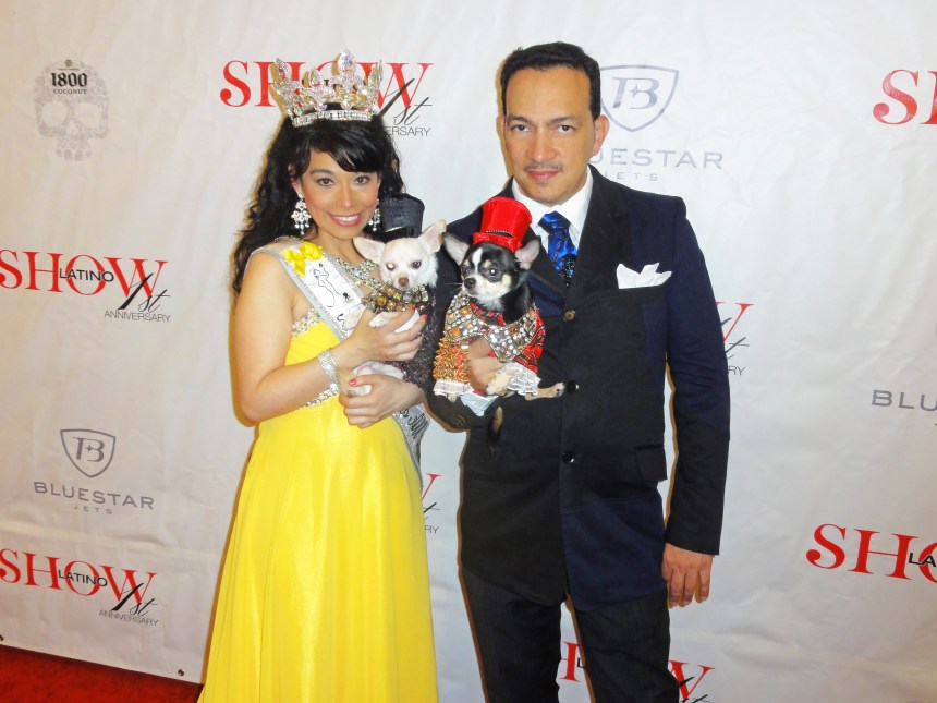 Anthony Rubio holding Bogie and Nency Escamilla holding Kimba