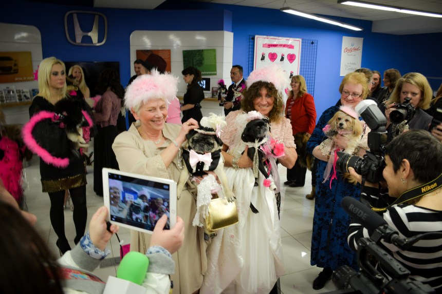 Bride Rose with mom Lisa  and Groom Kisket with his mom Vicki exchange vows at the Wedding