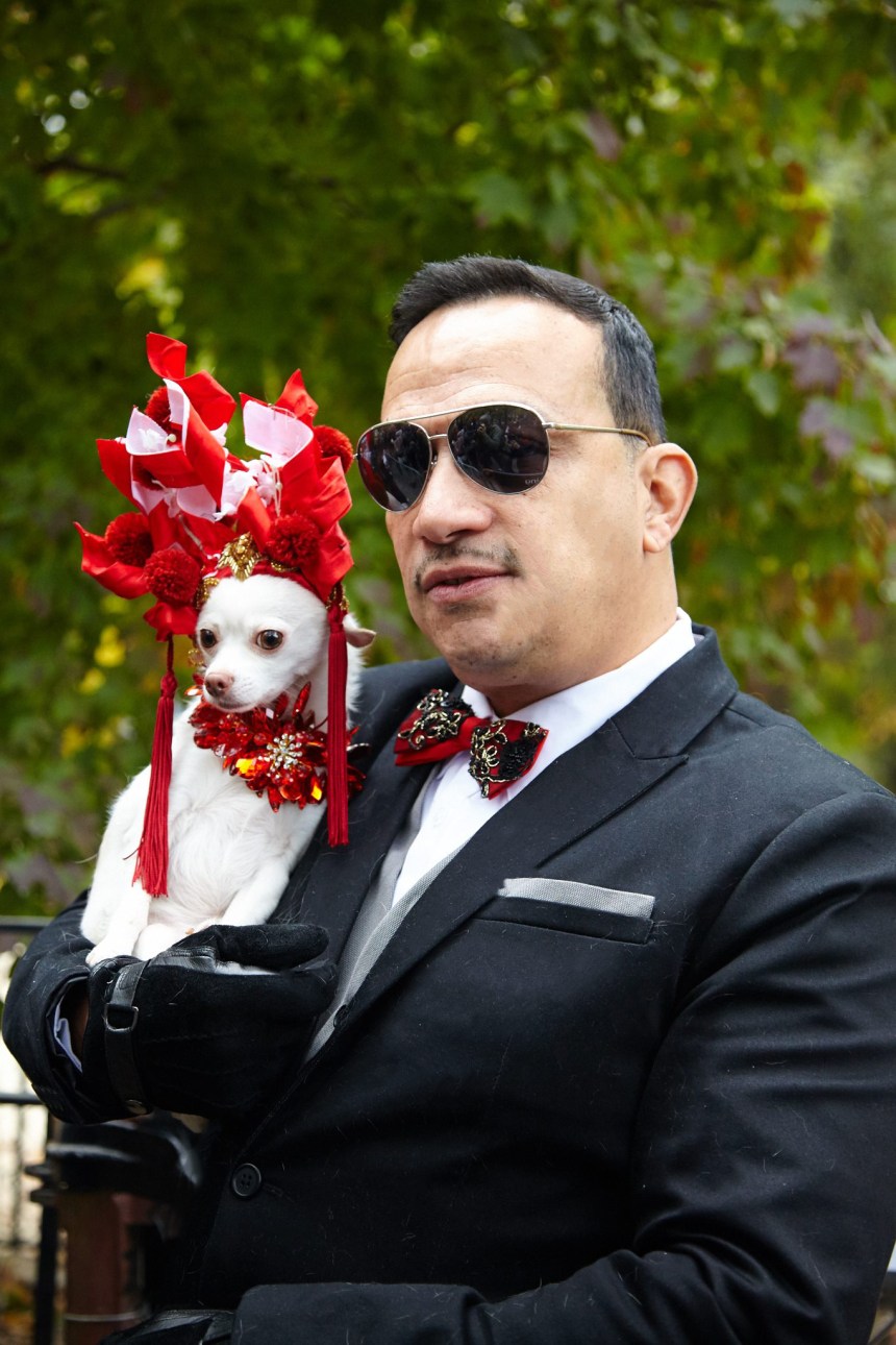 Anthony Rubio with Chihuahua Kimbas as Sarah Jessica Parker at The Met Gala at The 25th Annual Tompkins Square Halloween Dog Parade