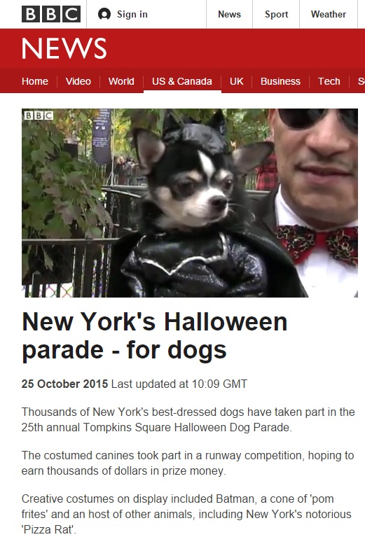 Anthony Rubio with Chihuahua Bogie as Batman at The 25th Annual Tompkins Square Halloween Dog Parade