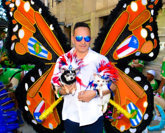 Anthony Rubio with Chihuahuas Bogie and Kimba at the National Puerto Rican Day Parade in New York
